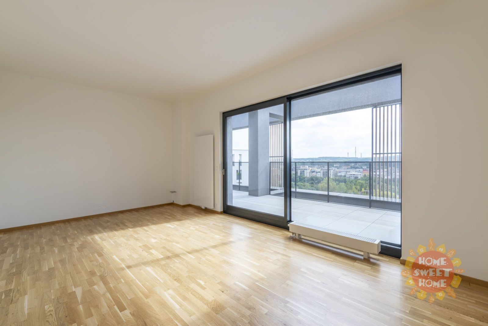 Prodej bytu 2+kk o velikosti 72 m2, terasa s výhledem (50 m2), garážové stání, Praha 9 - Vysočany, obrázek č. 3